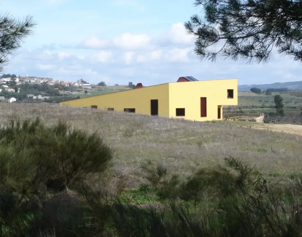 Eco house in Covilhã with village behind