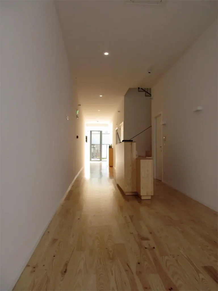 Minimalist wood counter on the Hostel lobby