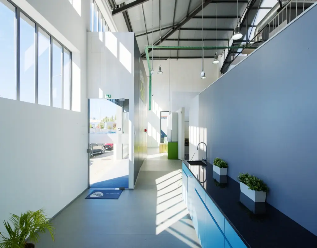 The staff entrance area is bathed in light.