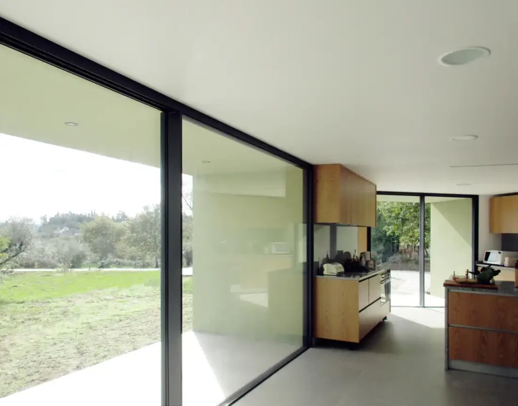 Large porch and big windows on the kitchen